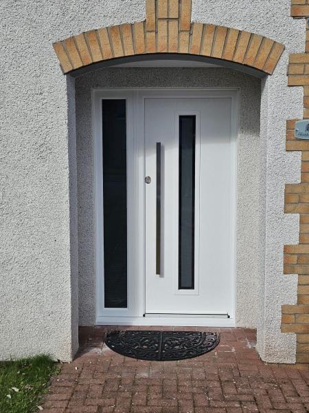 White modern composite door with flat bar handle 