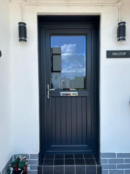 Anthracite ribbed upvc door with bespoke glass installed in Glasgow